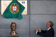 Portugal's President Marcelo Rebelo de Sousa unveils a plaque during the ceremony to rename Funchal airport as Cristiano Ronaldo Airport in Funchal, Portugal March 29, 2017. REUTERS/Rafael Marchante