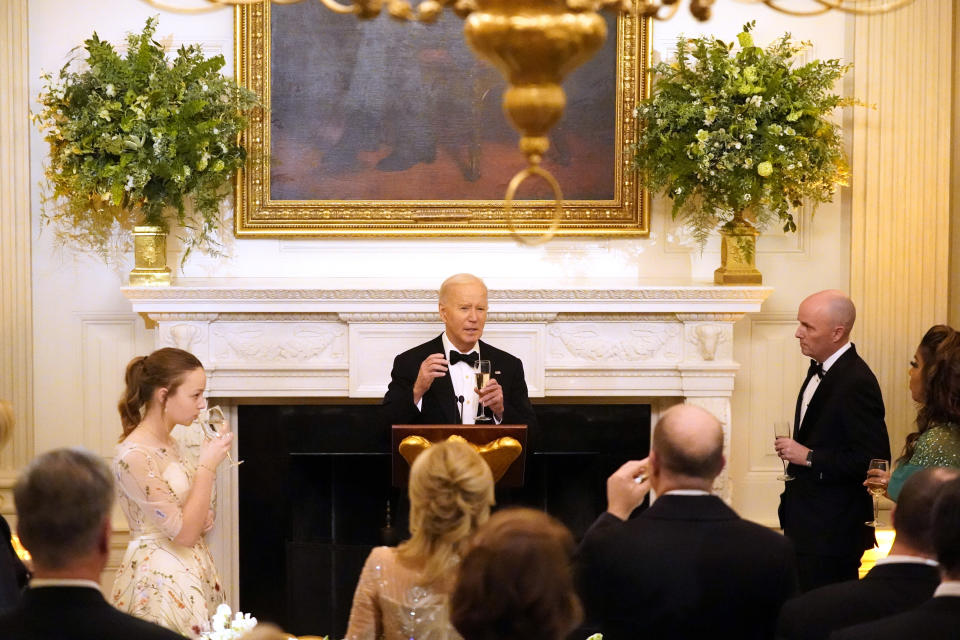 President Joe Biden speaks to members of the National Governors Association and their wives before a dinner in the State Dining Room of the White House in Washington, Saturday, Feb. 24, 2024. (AP Photo/Stephanie Scarbrough)