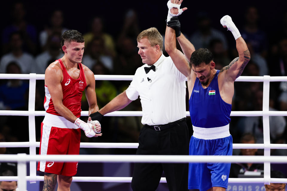 PARIS, FRANCE – JULY 29: Richard Kovacs of Hungary defeats Harry Garside of Australia in their round of 16 match of the Men's -63.5kg during the Paris 2024 Olympic Games match between Harry Garside of Australia and Richard Kovacs of Hungary at Roland Garros on July 29, 2024 in Paris, France. (Photo by Pete Dovgan/Speed ​​​​Media/Icon Sportswire via Getty Images)