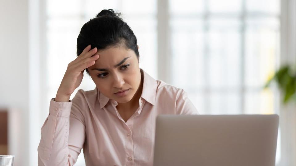 Upset woman frustrated by computer problem