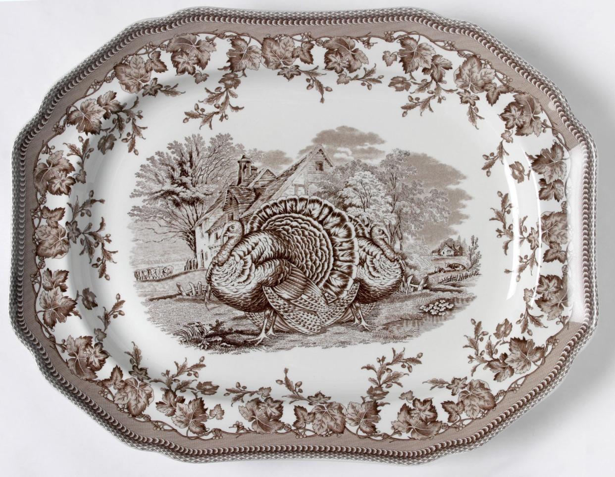 Spode, England's oldest pottery company, designed this turkey platter, with its brown-and-white Westbourne pattern, exclusively for Williams-Sonoma several years back. Spode artisans transfer original patterns from hand-engraved copper plates onto glazed earthenware, a centuries-old process that makes the pieces microwaveable and dishwasher safe.