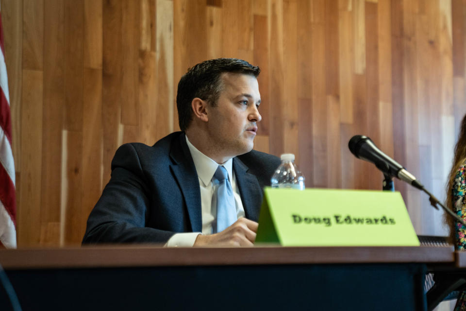 Buncombe County district attorney candidate Doug Edwards answered questions submitted by business owners at a Council of Independent Business Owners meeting on April 1, 2022.