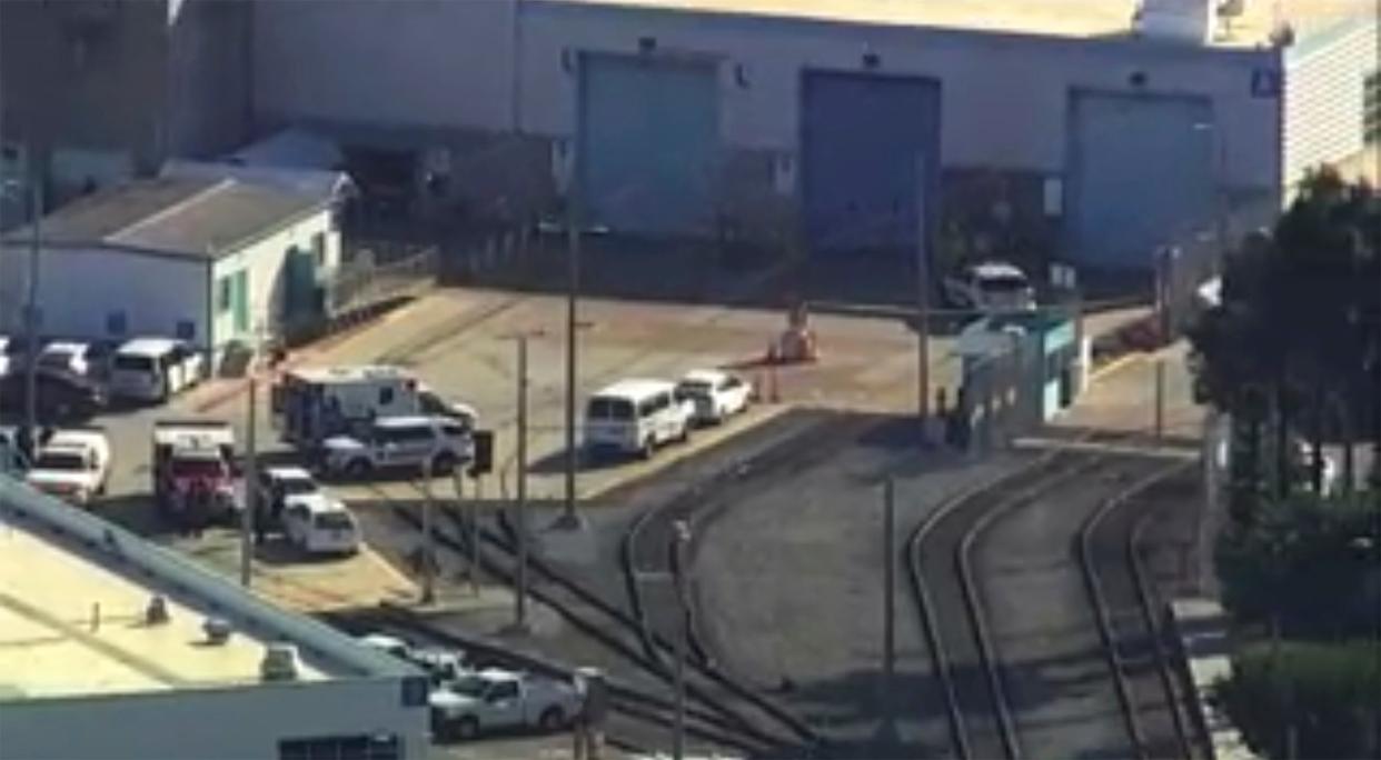 County sheriff’s spokesman said there are multiple fatalities and injuries in a shooting at a rail yard and that the suspect is dead. (KGO-TV/ABC7 via AP)