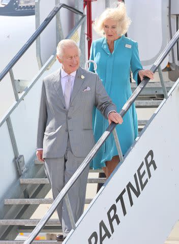 <p>CHRIS JACKSON/POOL/AFP via Getty Images</p> King Charles and Queen Camilla arrive in Bordeaux, France on their last foreign trip in September