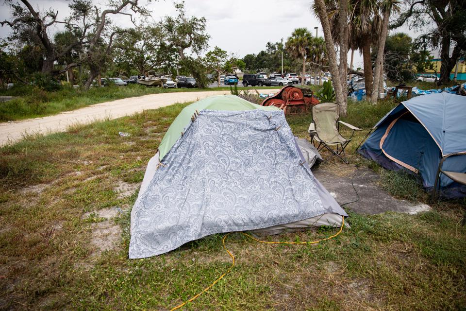 Michele Bryant has lived in a tent since Hurricane Ian roared ashore. She work the shrimp docks on Fort Myers Beach. She says she has been to the hospital twice because of heat related issues.