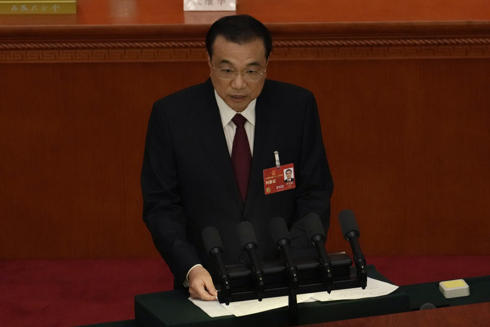 Chinese Premier Li Keqiang delivers his state of the nation address during the opening session of China's National People's Congress (NPC) at the Great Hall of the People in Beijing, Sunday, March 5, 2023. After a decade in Chinese President Xi Jinping's shadow, Li Keqiang is taking his final bow as the country's premier, marking a shift away from the skilled technocrats who have helped steer the world's second-biggest economy in favor of officials known mainly for their unquestioned loyalty to China's most powerful leader in recent history. (AP Photo/Ng Han Guan)