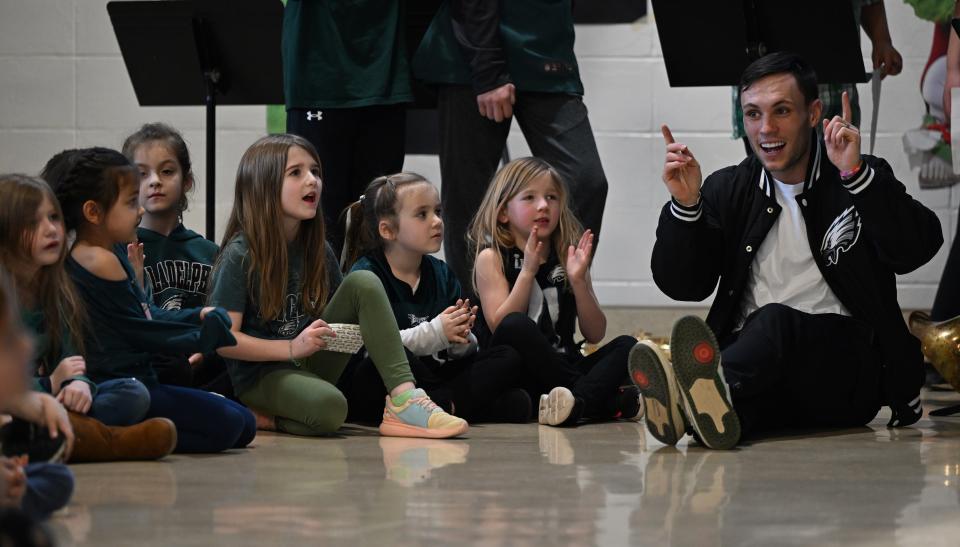 Eagles punt returner Britain Covey sits with students Wednesday, Feb. 1, 2023, at  Richland Elementary in Richland Township. Covey visited the school and answered questions from students ahead of the team's Super Bowl appearance against the Kansas City Chiefs.