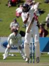 India's Ishant Sharma plays a shot during the first innings on day two of the second international test cricket match against New Zealand at the Basin Reserve in Wellington, February 15, 2014. REUTERS/Anthony Phelps (NEW ZEALAND - Tags: SPORT CRICKET)