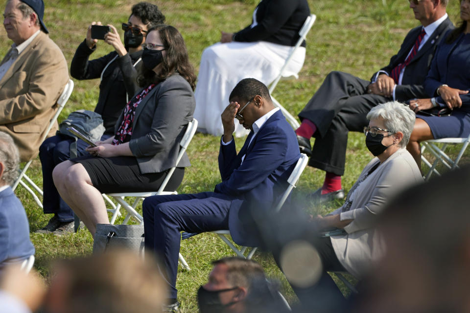 A moment of silence is observed at the Wall of Names at the Flight 93 National Memorial in Shanksville, Pa. during a Service of Remembrance, Saturday, Sept. 11, 2021, on the 20th anniversary of the Sept. 11, 2001 attacks. (AP Photo/Gene J. Puskar)