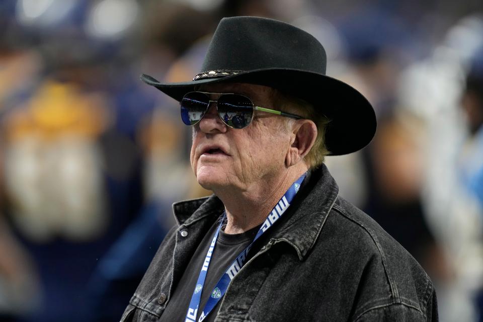 Jerry Glanville, former NFL coach and NASCAR driver is seen during the second half of the Mid-American Conference championship NCAA college football game between Toledo and Miami (Ohio), Saturday, Dec. 2, 2023, in Detroit. (AP Photo/Carlos Osorio)