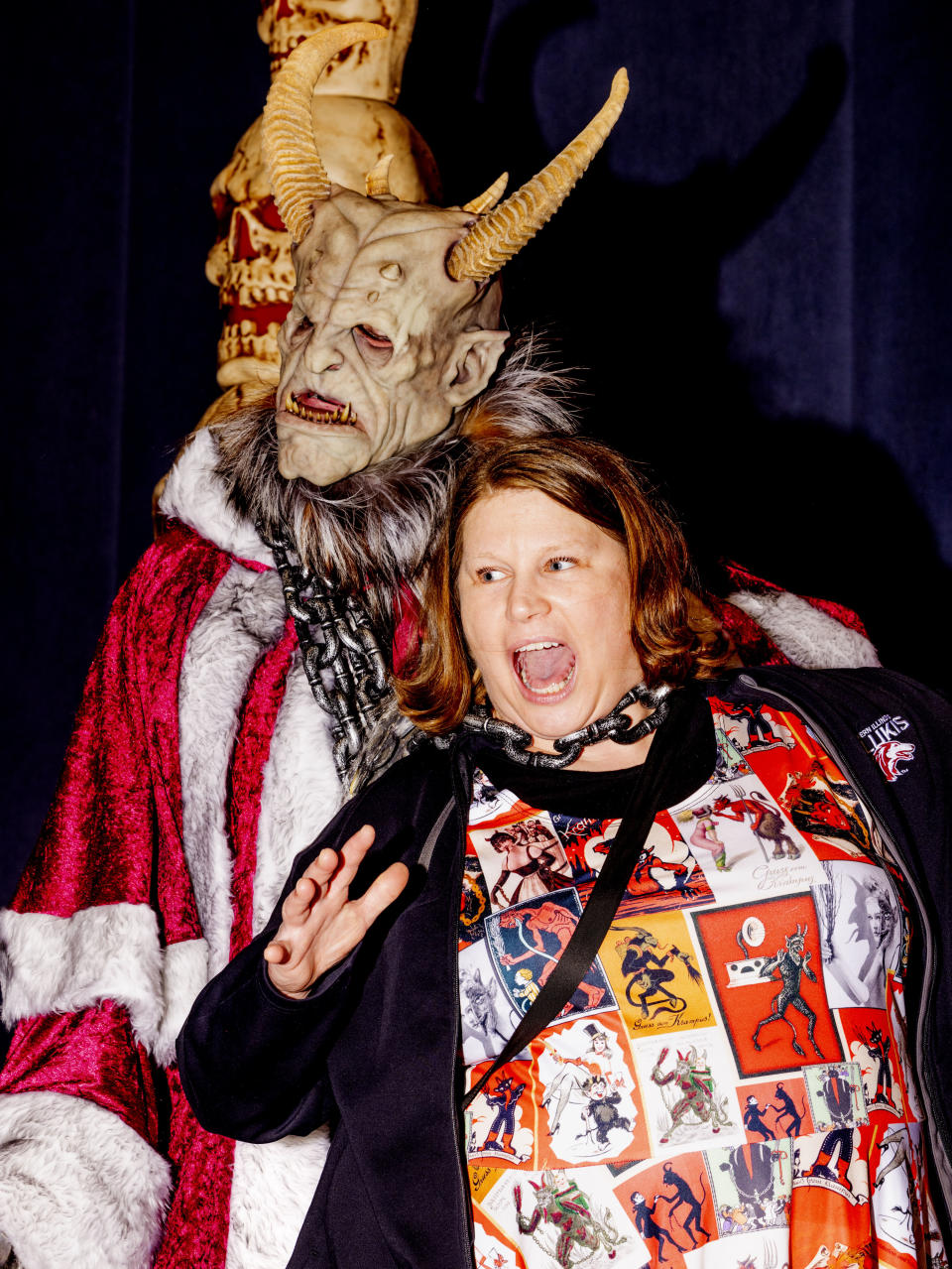 Kelly Cusion gets a photo with Krampus at "A Christmas to Dismember." 