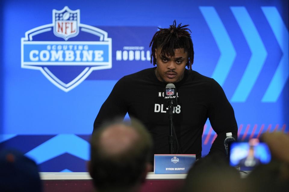 Texas defensive lineman Byron Murphy speaks during a news conference at the NFL football scouting combine, Wednesday, Feb. 28, 2024, in Indianapolis. (AP Photo/Darron Cummings)