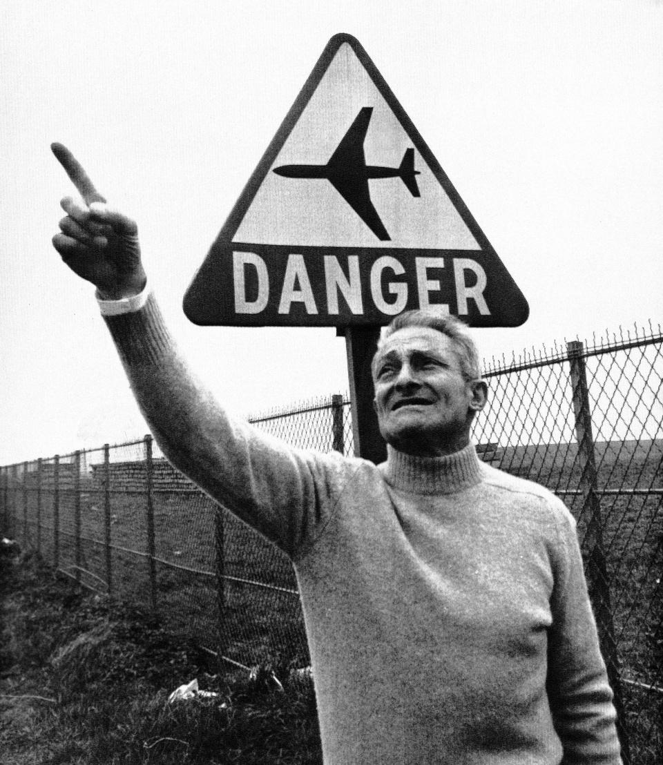 Andre Liblin, who advocated for banning Concorde, gestures at an airport