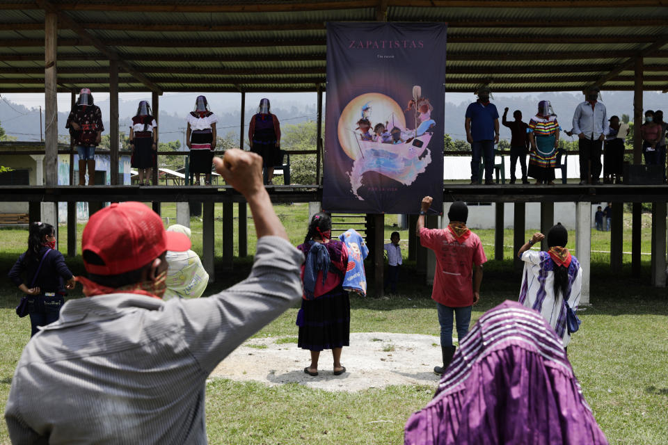 Members of the Zapatista Army of National Liberation, EZLN, bid farewell to a delegation that will leave for Europe on May 3, in the community of Morelia, Chiapas state, Mexico, Monday, April 26, 2021. The rebels say they are planning to take canoes on a trip to ‘invade’ Spain in May and June, as Mexico marks the anniversary of the 1519-1521 Spanish Conquest of Mexico. (AP Photo/Eduardo Verdugo)