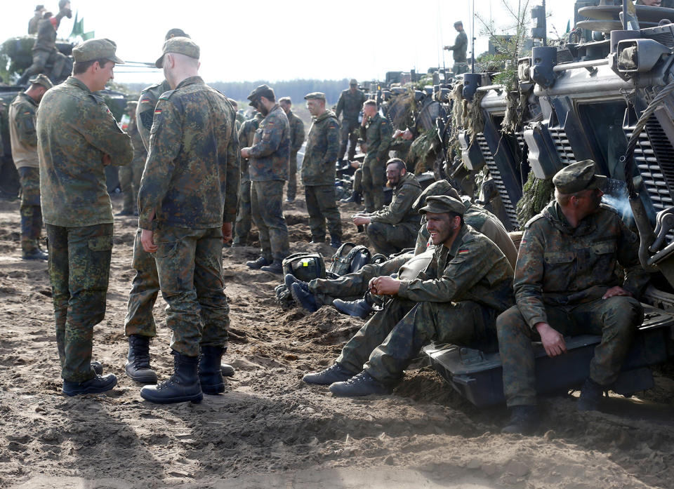 <p>German army soldiers rest after NATO enchanced Forward Presence Battle Group Lithuania exercise in Pabrade military training field, Lithuania, May 17, 2017. (Photo: Ints Kalnins/Reuters) </p>