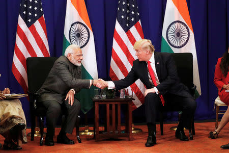 U.S. President Donald Trump shakes hands with India's Prime Minister Narendra Modi during a bilateral meeting alongside the ASEAN Summit in Manila, Philippines November 13, 2017. REUTERS/Jonathan Ernst/File Photo