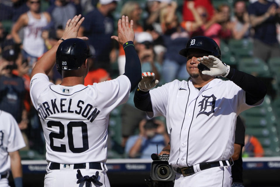 Detroit Tigers' Miguel Cabrera celebrates his three-run home run with Spencer Torkelson (20) against the Houston Astros in the eighth inning of a baseball game, Sunday, Aug. 27, 2023, in Detroit. (AP Photo/Paul Sancya)