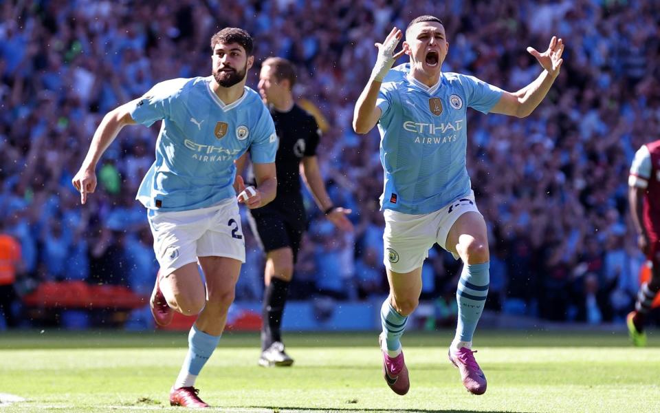 Phil Foden celebrates opening the scoring for Manchester City against West Ham on the final day of the Premier League/Foden comes of age, Haaland's self-sacrifice and Walker's call to arms: How Man City won title