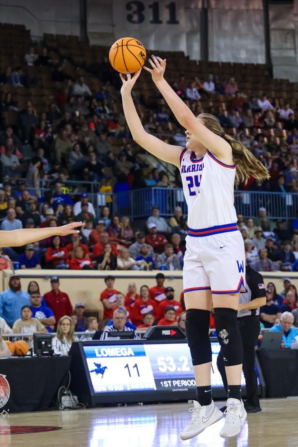 Hammon’s Henley West (24) shoots for two during the Class B girls championship game between the Hammon Lady Warriors and the Lomega Lady Raiders at the Jim Norick Arena in Oklahoma City on Saturday, March 4, 2023. 