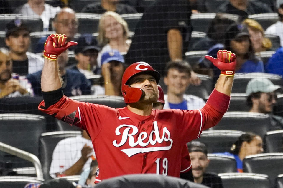 Cincinnati Reds' Joey Votto celebrates his solo home run in the sixth inning of the baseball game against the New York Mets, Friday, July 30, 2021, in New York. (AP Photo/Mary Altaffer)