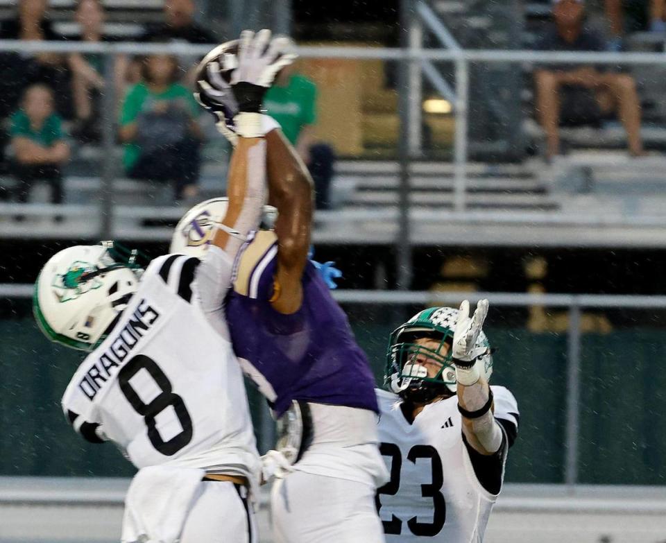 Carroll defensive back Carter High (8) breaks up a pass intended for Timber Creek wide receiver Cameron Hunter (6) in the first half of a UIL high school football game at Keller ISD Stadium in Keller, Texas, Thursday, Sept. 14, 2023. Special to the Star-Telegram/Bob Booth