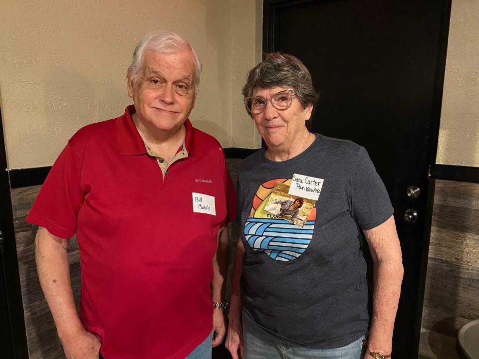 Former Sunland Hospital workers Bill Mabile (left) and Sara Carter (right) attend a workers reunion in Tallahassee on March 8, 2024.