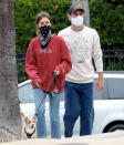 <p>Lily Collins and boyfriend Charlie McDowell take their dog for a walk in L.A. on Thursday.</p>