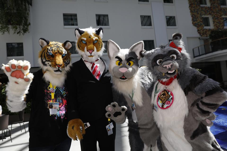 Participants dressed as cuddly animals arrive for the annual Eurofurence "furries" gathering at the Estrel Hotel on August 22, 2018, in Berlin, Germany.