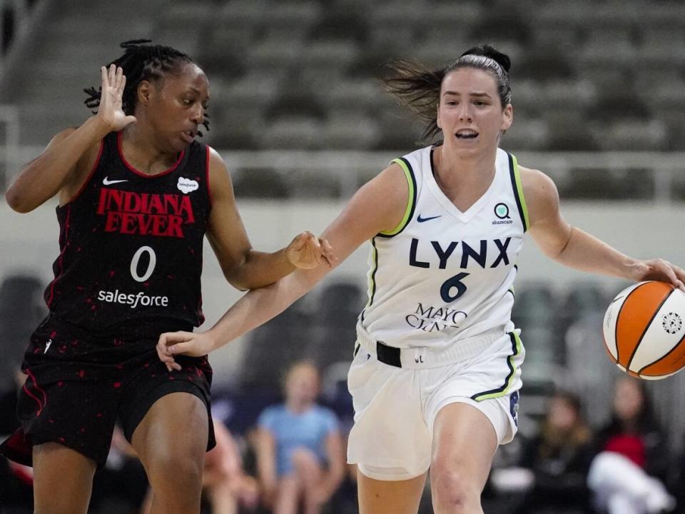 Canada's Bridget Carleton, right, will be playing in the WNBA exhibition game in Toronto this weekend. (Associated Press - image credit)