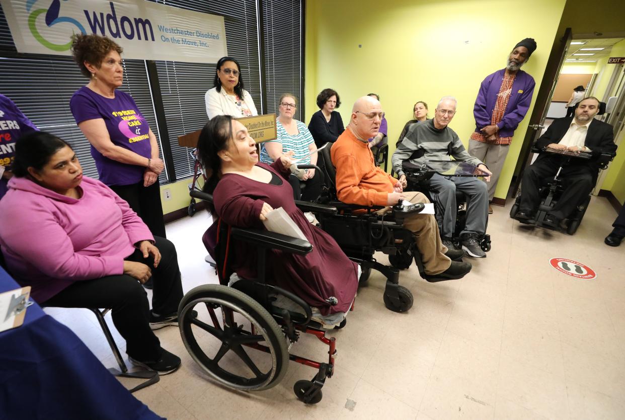Geri Mariano, in wheelchair, delivers remarks during a gathering at the Westchester Disabled On the Move office in Yonkers, March 15, 2024. New York's Consumer Directed Personal Assistance Program, known as CDPAP, allows people to hire their own home-care support. New York Governor Kathy Hochul's 2025 budget planned cuts to the program, which is funding through Medicaid, but the final budget restored the funding.