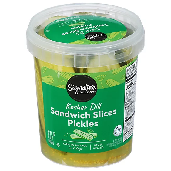 A plastic container of Signature Select Kosher Dill Sandwich Slices Pickles; the label highlights "Farm to package in 7 days" and "Never heated"