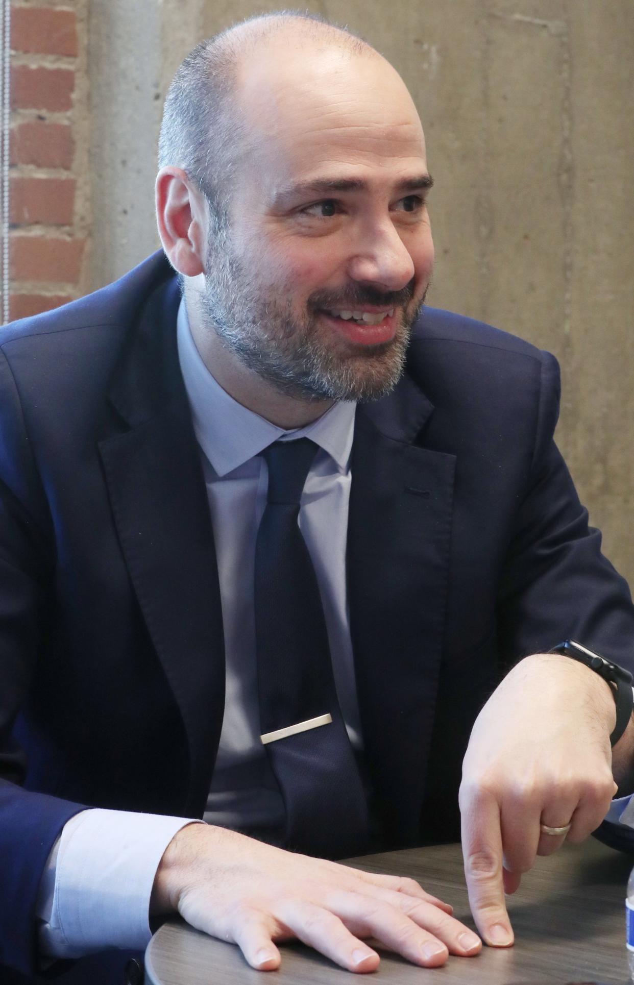 Summit County Prosecutor Elliot Kolkovich gestures during a meeting with editors and reporters at The Akron Beacon Journal. Kolkovich was appointed recently after Sherri Bevan Walsh's retirement.