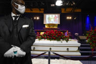 The casket of Daunte Wright rests in place before funeral services at Shiloh Temple International Ministries in Minneapolis, Thursday, April 22, 2021. Wright, 20, was fatally shot by a police officer during a traffic stop. (AP Photo/John Minchillo, Pool)