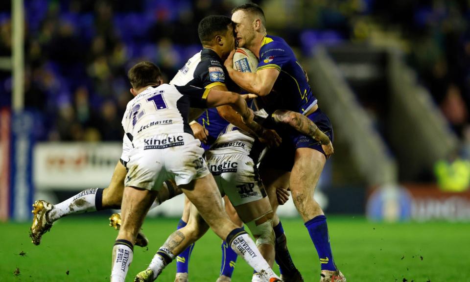 <span>Warrington’s Nu Brown and Hull FC’s Ben Currie clash head last month in a game in whicht the Wolves player’s sending-off proved contentious.</span><span>Photograph: Richard Sellers/PA</span>