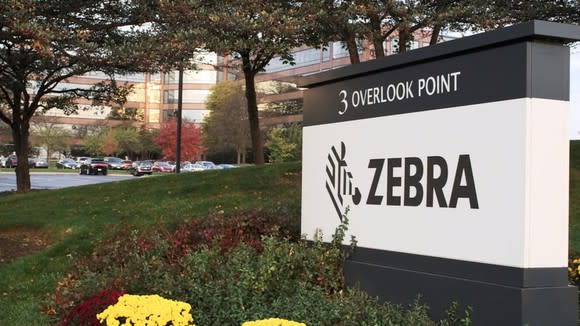 Zebra Technology's logo on a sign outside the company HQ campus in Lincolnshire, Illinois.