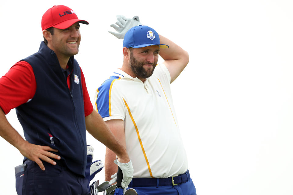 Scottie Scheffler and Jon Rahm look on during a PGA event on Sept. 26, 2021. Which player will do better at the PGA Championship? (Patrick Smith/Getty Images)
