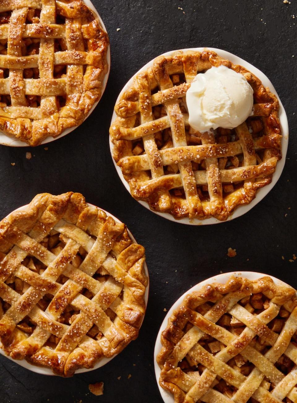 mini baked apple pies in red and white mini baking dishes