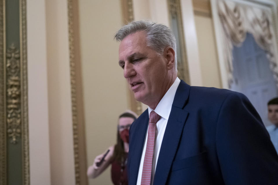 House Minority Leader Kevin McCarthy, R-Calif., walks to the chamber from his office the day after House investigators issued a subpoena to McCarthy and four other GOP lawmakers as part of their probe into the violent Jan. 6 insurrection, at the Capitol in Washington, Friday, May 13, 2022. The House Select Committee on the January 6 Attack has been investigating McCarthy's conversations with then-President Donald Trump the day of the attack and meetings that the four other lawmakers had with the White House as Trump and his aides conspired how to overturn his defeat. (AP Photo/J. Scott Applewhite)