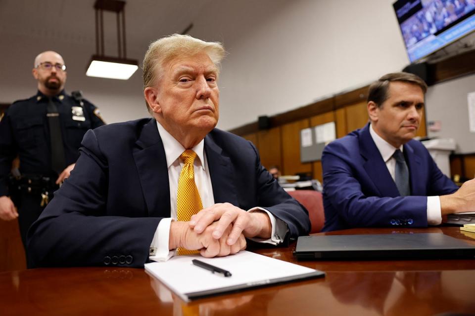 Donald Trump appears in criminal court in Manhattan during his hush money trial on May 21. New York’s highest court rejected his request for a swift appeal of a gag order in the case on June 18. (AP)