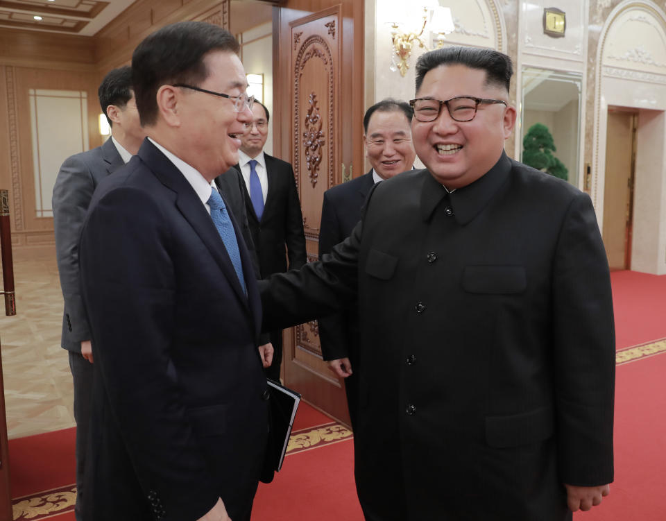 In this Wednesday, Sept. 5, 2018 photo provided on Thursday, Sept. 6, 2018 by South Korea Presidential Blue House via Yonhap News Agency, North Korean leader Kim Jong Un, right, meets with South Korean National Security Director Chung Eui-yong in Pyongyang, North Korea. A South Korean delegation met with North Korean leader Kim Jong Un on Wednesday during a visit to arrange an inter-Korean summit planned for this month and help rescue faltering nuclear diplomacy between Washington and Pyongyang. (South Korea Presidential Blue House/Yonhap via AP)