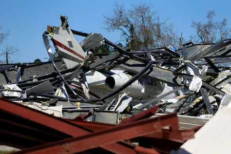 A damaged Bombardier Challenger 350 jet is seen at the Eufaula Municipal Airport, after a string of tornadoes, in Eufaula, Alabama, U.S., March 5, 2019. REUTERS/Elijah Nouvelage