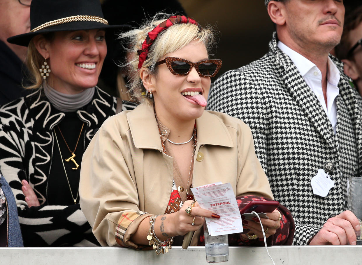 Lily Allen reacts during Gold Cup Day of the 2019 Cheltenham Festival at Cheltenham Racecourse.