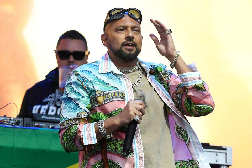 <p>Tim Mosenfelder/Getty</p> Sean Paul performs in North Carolina in April 2023