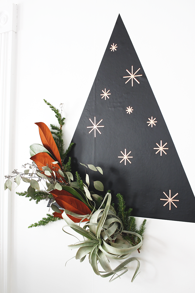 <p>This alternative tree can be fashioned using black contact paper and copper tape. But the real showstopping element of this DIY project is the <em>real</em> air plant garland that's attached.</p><p><strong>Get the tutorial at <a href="http://idlehandsawake.com/diy-modern-air-plant-garland/" rel="nofollow noopener" target="_blank" data-ylk="slk:Idle Hands Awake;elm:context_link;itc:0;sec:content-canvas" class="link ">Idle Hands Awake</a>.</strong></p><p><a class="link " href="https://www.amazon.com/Home-Dr-Decorative-Wallpaper-Countertop/dp/B07RDB8C3F/ref=sr_1_4?tag=syn-yahoo-20&ascsubtag=%5Bartid%7C10050.g.28872053%5Bsrc%7Cyahoo-us" rel="nofollow noopener" target="_blank" data-ylk="slk:SHOP BLACK CONTACT PAPER;elm:context_link;itc:0;sec:content-canvas">SHOP BLACK CONTACT PAPER</a></p>