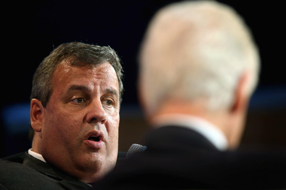 New Jersey Governor Chris Christie (L) and former President Bill Clinton speak to guests at the Clinton Global Initiative (CGI) on June 14, 2013 in Chicago, Illinois. 