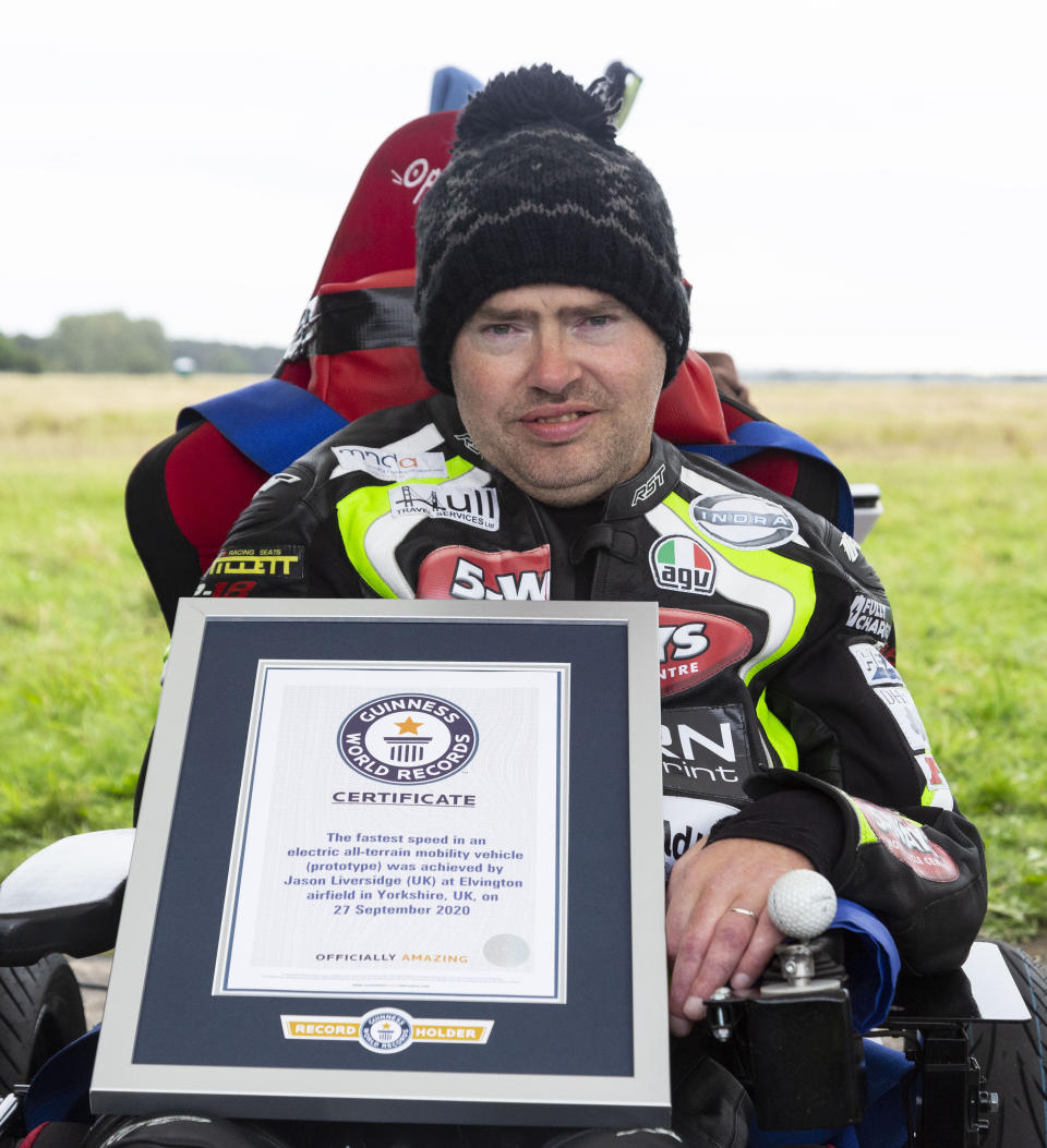 Wacky design engineer sets new Guinness World Record after reaching speeds of over 40mph - in a WHEELIE BIN