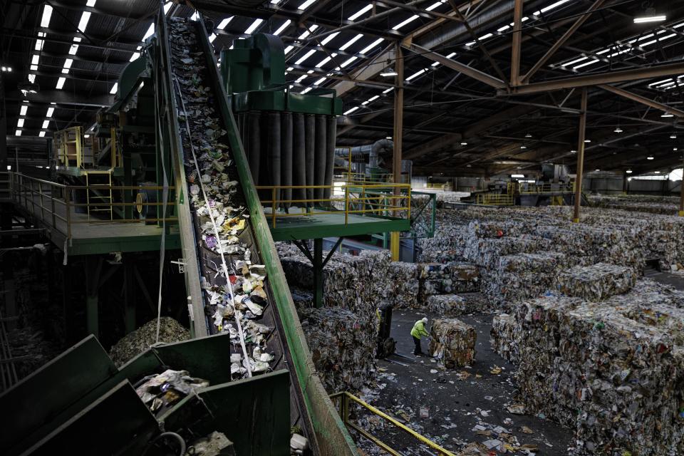 Mixed plastics at a Recology recycling plant in San Francisco, California, in a photograph at the ArtScience Museum's Planet Or Plastic exhibition by National Geographic. (Photo: Randy Olson)