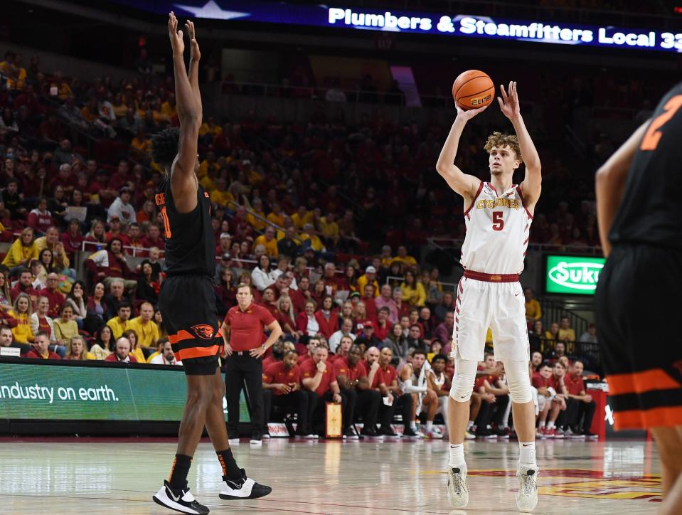 Iowa State’s forward Aljaz Kunc(5) takes a three-point shot over Oregon State's forward Warith Alatishe(10) during the first half at Hilton Coliseum Friday, Nov. 12, 2021, in Ames, Iowa.