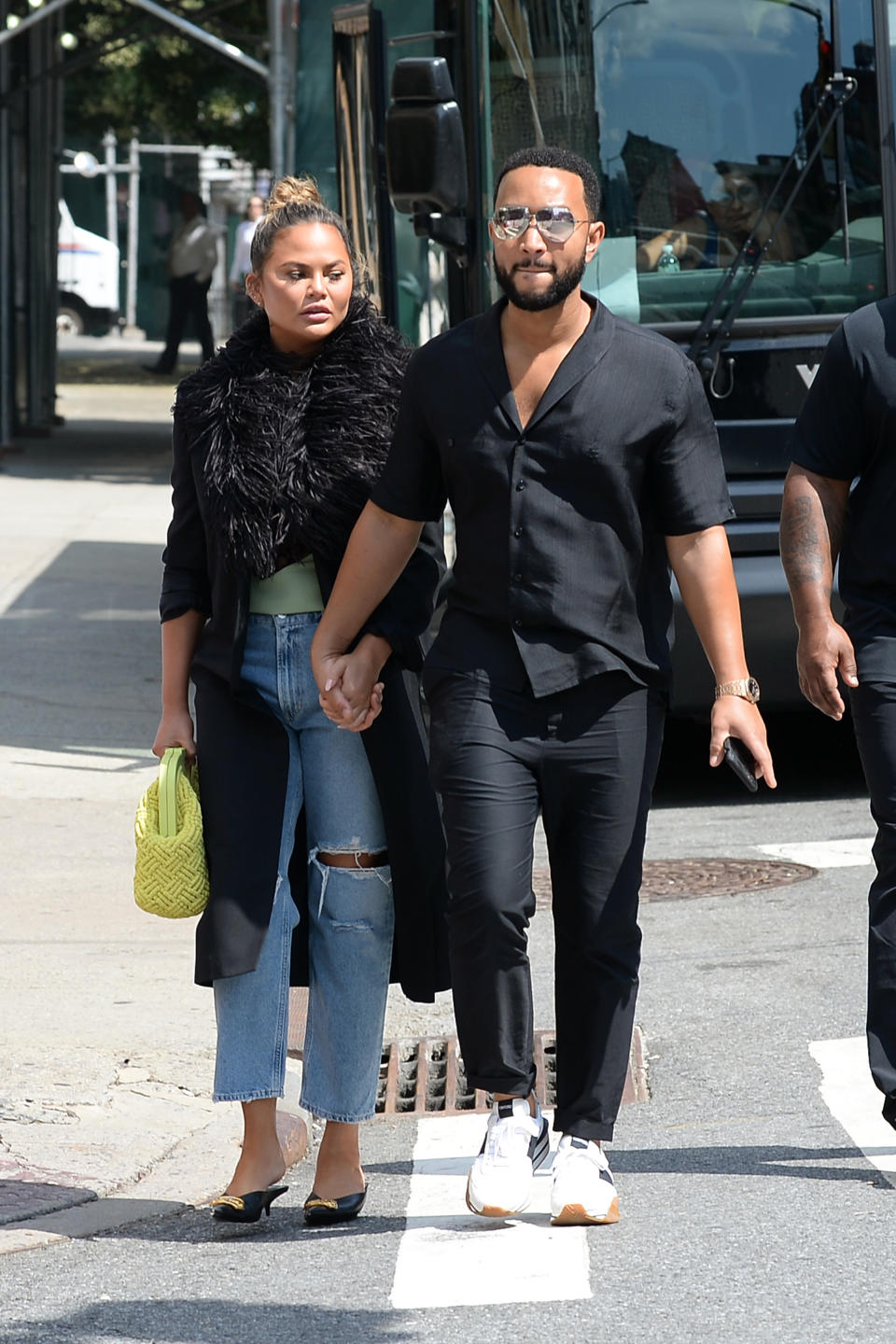 Chrissy Teigen and John Legend walk to a lunch date in New York City. - Credit: Elder Ordonez / SplashNews.com