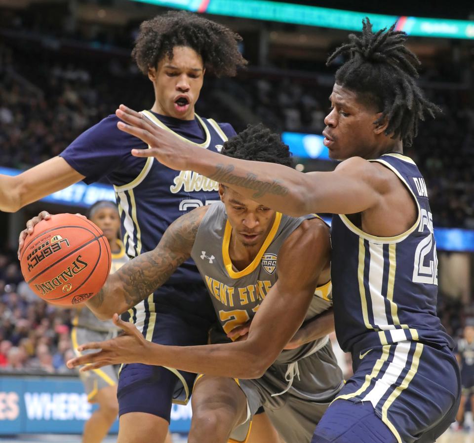 Akron's Enrique Freeman, left, and Mikal Dawson - in action during the MAC title game a year ago - combined for 32 points and 19 rebounds Monday at South Dakota State.